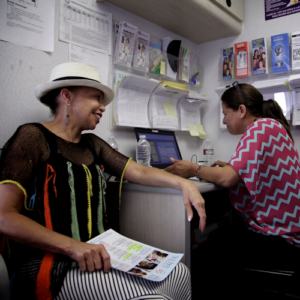 woman getting CalAIM services