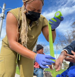 street health worker with patient